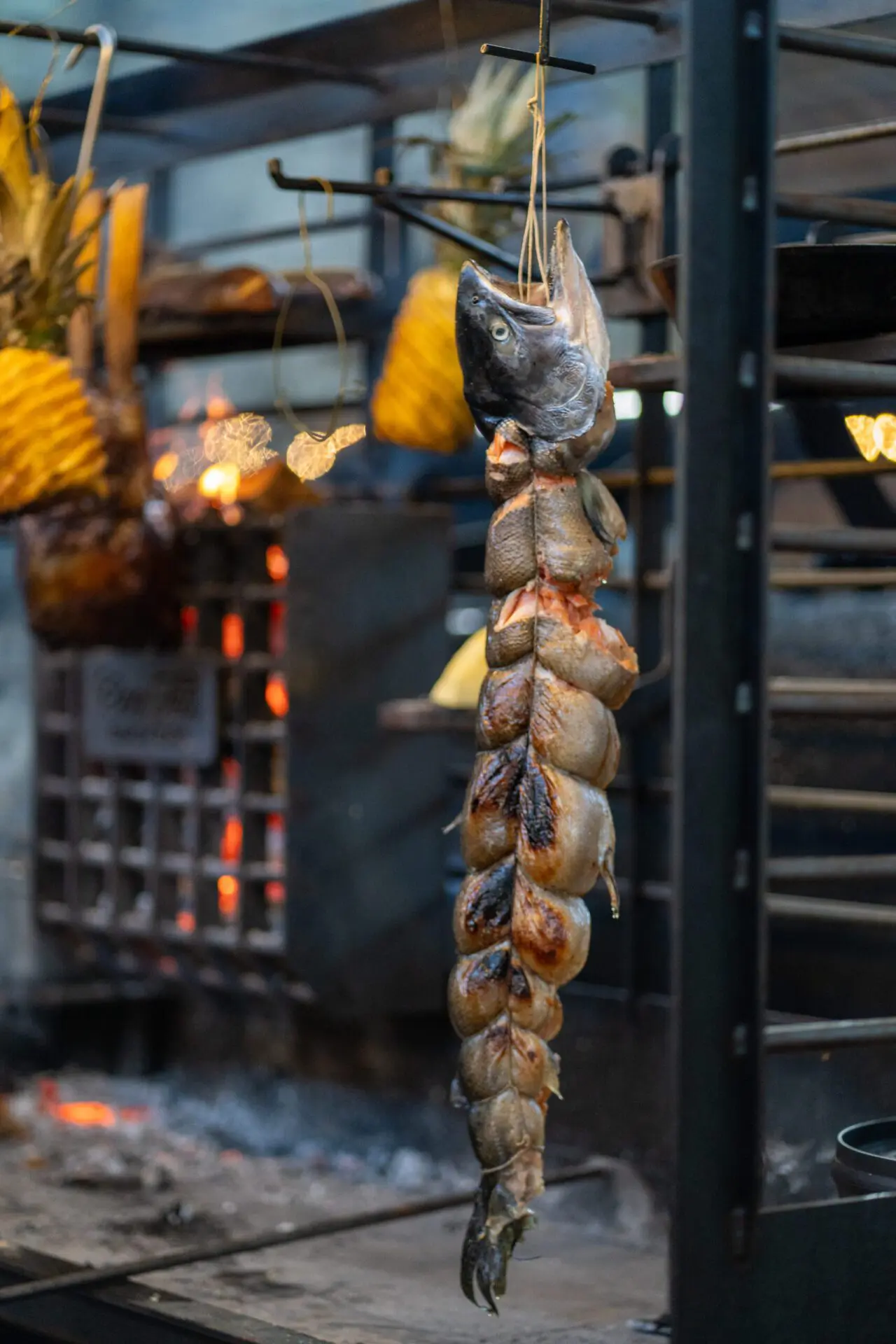 Smoked fish hanging in a traditional smokehouse.