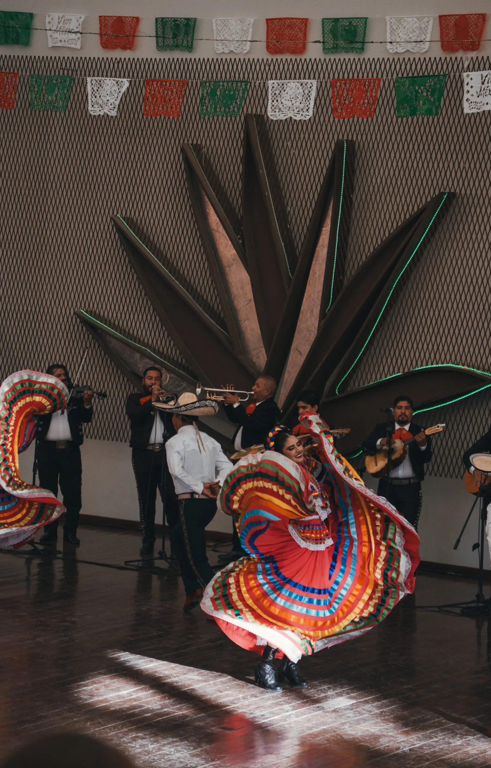 Traditional Mexican dance performance with vibrant costumes and live musicians.